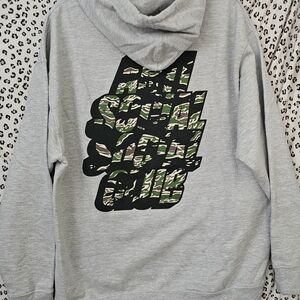 Anti Social Social Club Gray Hoodie with Green Camouflage Logo